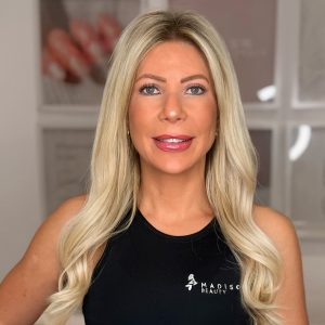 Madison in Madison Beauty branded uniform